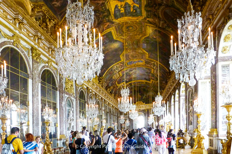 Hall of Mirrors in Versailles seen during a guided tour Hall of Mirrors in Versailles seen during a guided tour