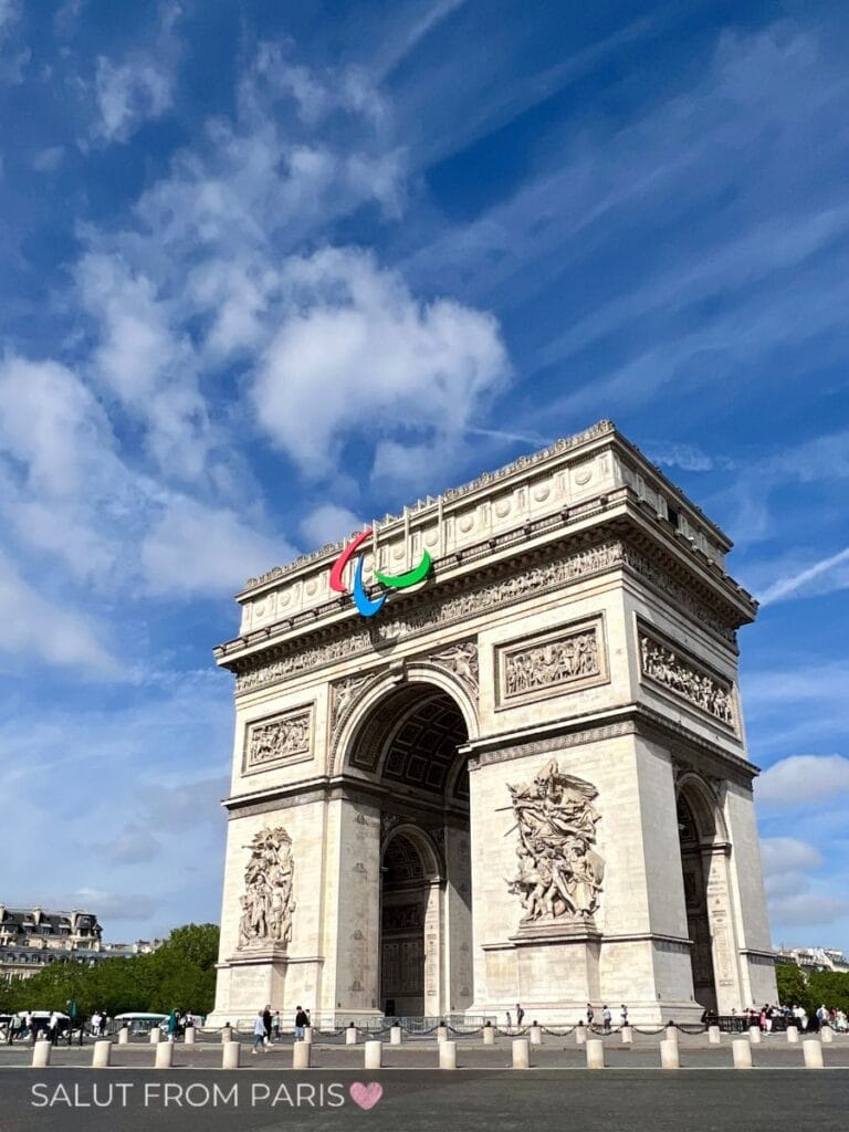 Visit the Arc de Triomphe: Worth the climb? The Arc de Triomphe with the logo of the Paralympics 2024