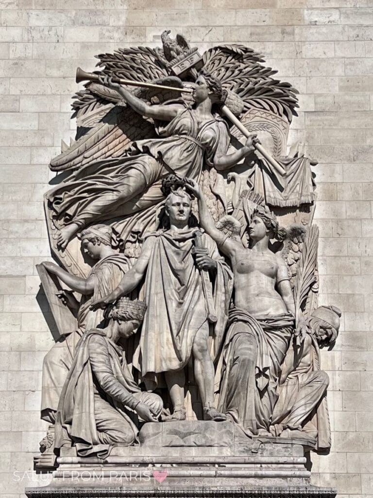 Visit the Arc de Triomphe: Worth the climb? Napoleon on one of the pillars of the Arc de Triomphe