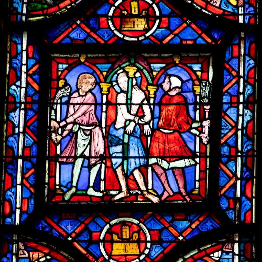 Visiting La Sainte Chapelle Paris: A complete guide Image of a stained glass window in Sainte Chapelle Paris